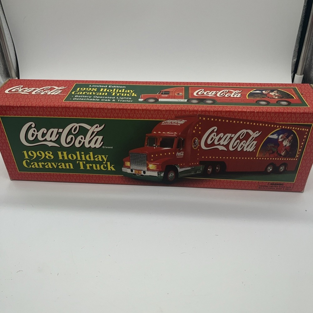 NIB Vintage 1998 Coca Cola Holiday Caravan Battery Light Truck featuring Santa